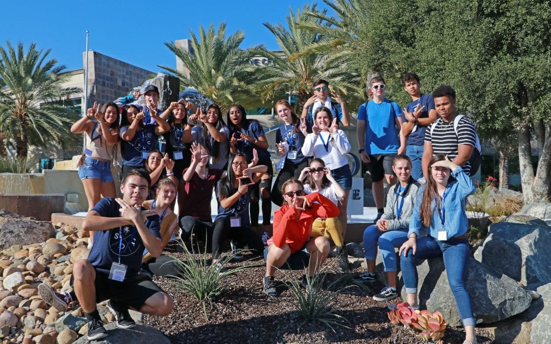 San Diego Christian College students pose in front of SDCC fountain