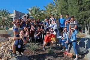 San Diego Christian College students pose in front of SDCC fountain
